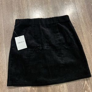 NWT black corduroy mini skirt